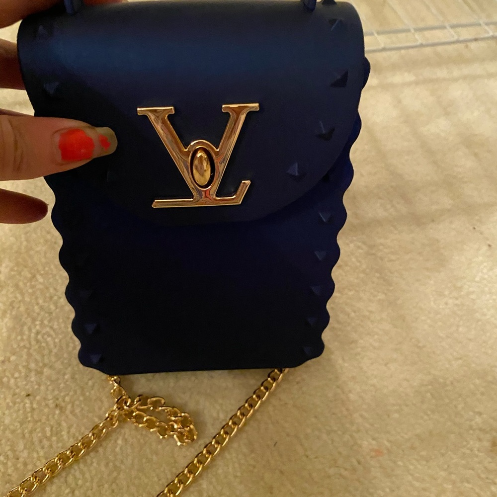 Little box like purse with the shoulder strap
